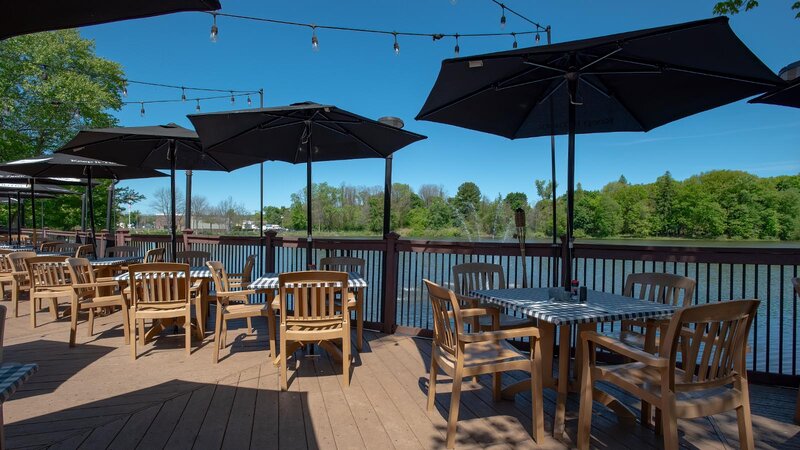 Tables and umbrellas at outdoor dining patio