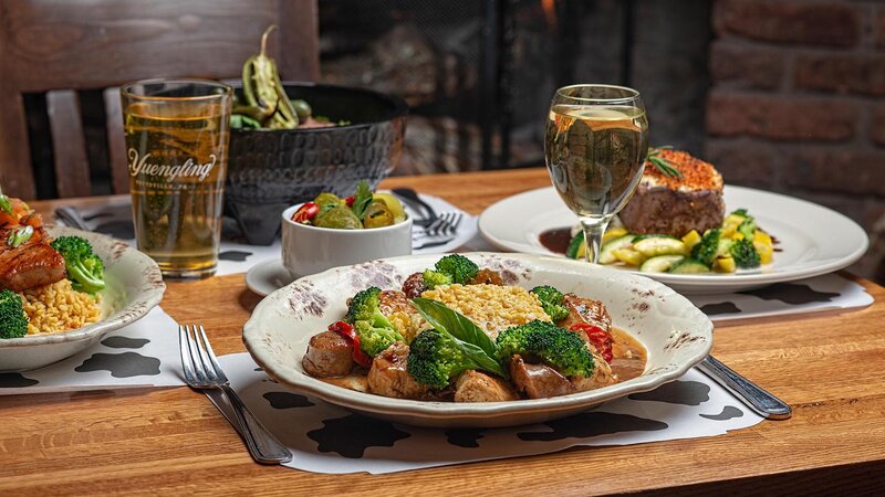 Sausage and peppers with rice and vegetables